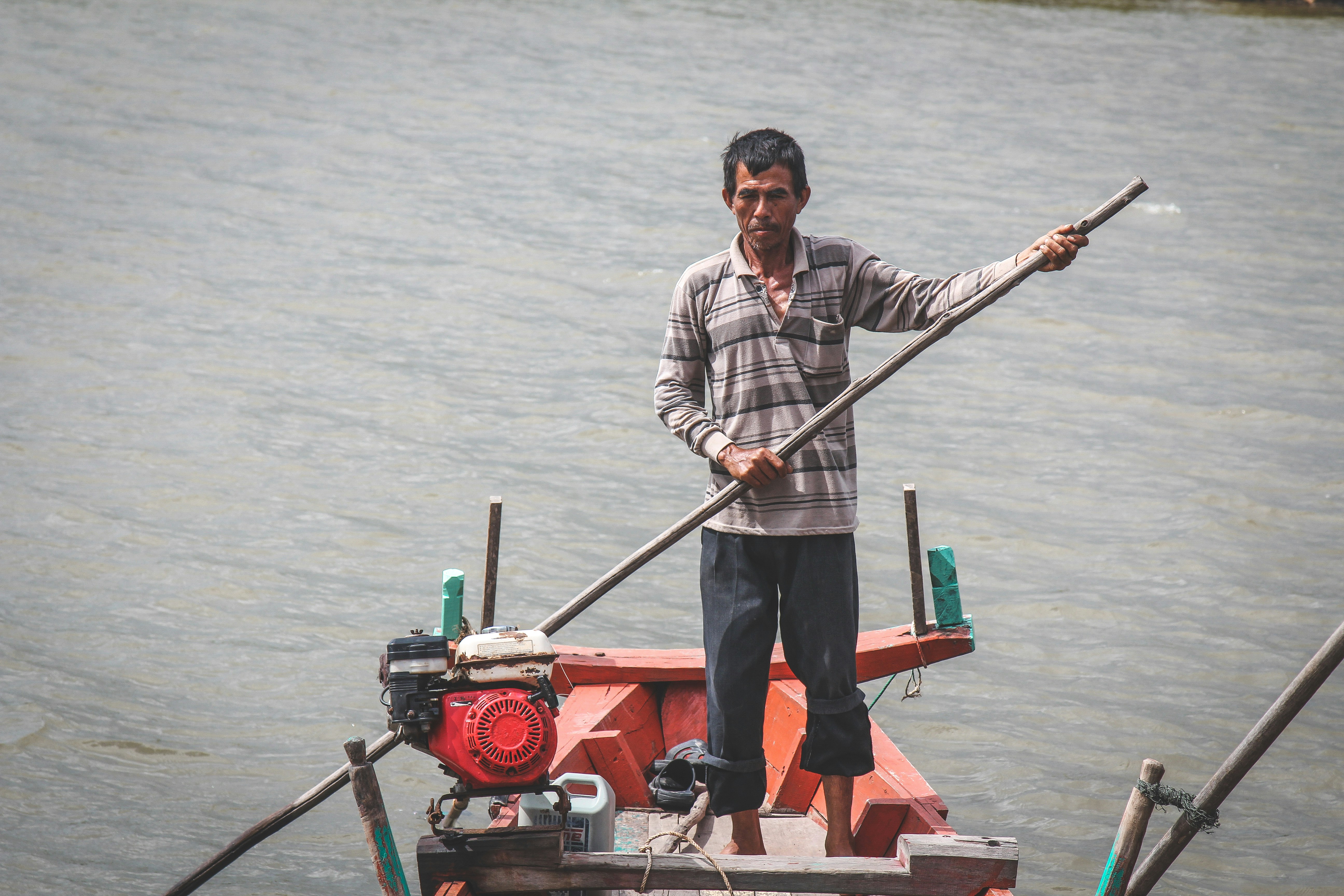 man riding on boat, 
