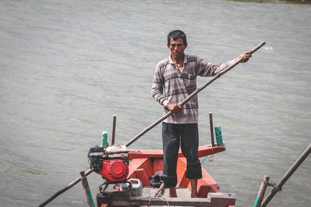 man riding on boat