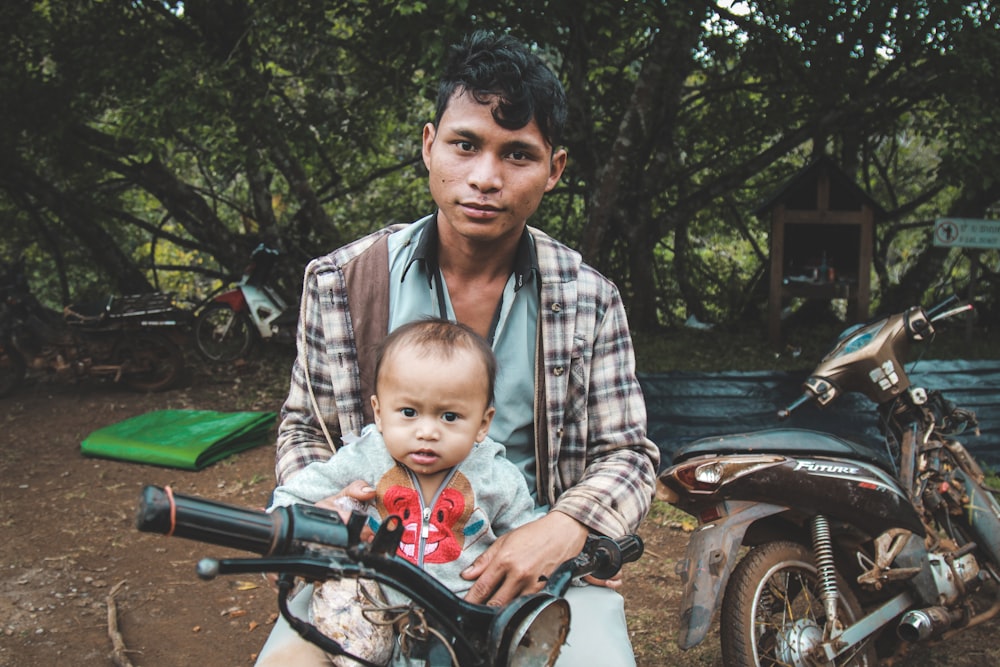 man riding on motorcycle