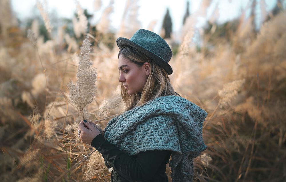 woman standing near field