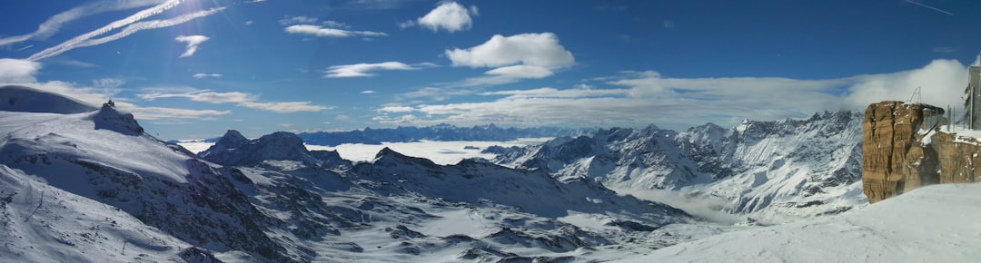 aerial photo of snow covered mountain during daytime