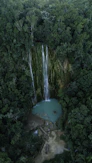 selective focus photography of waterfalls during daytime
