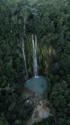 selective focus photography of waterfalls during daytime