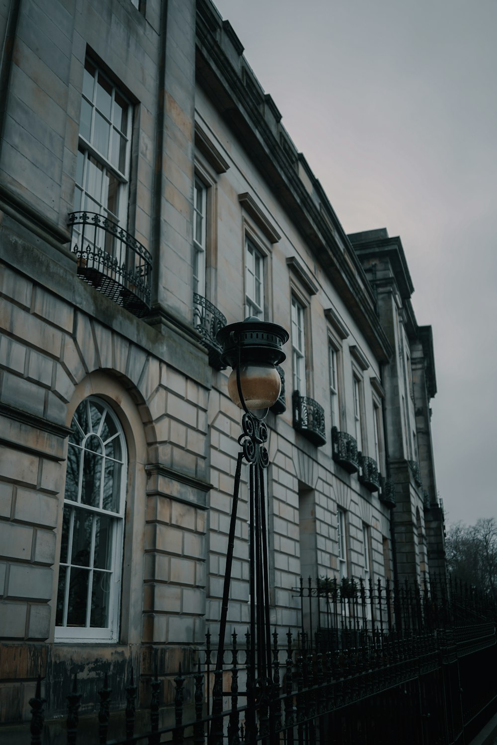 lamp post outside concrete building