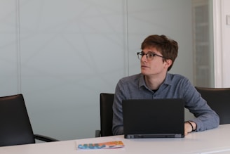 Headshot of a dedicated broker collaborating remotely on marketing strategies.