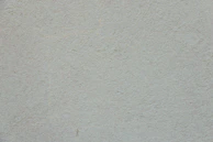 Freshly painted neutral-toned interior wall with smooth finish.