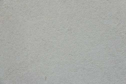 Newly painted interior wall with smooth, even coverage in a warm neutral tone.