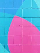 Vibrant painted wall showcasing a mix of bold and soft colors.