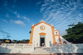 white concrete church under blue sky