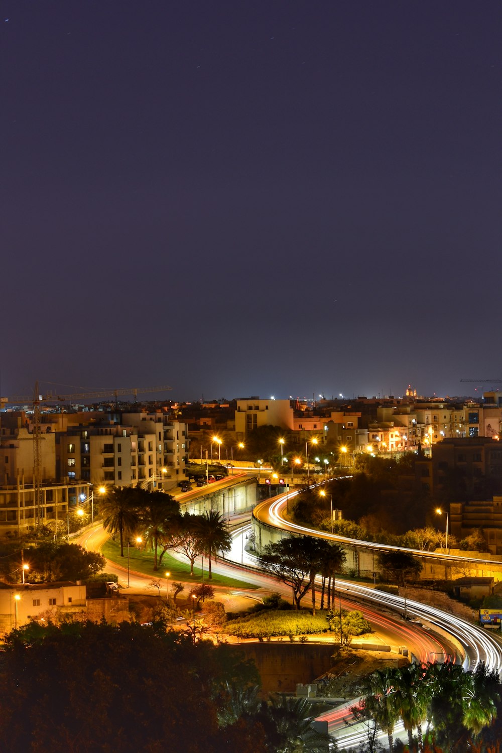 time lapse photography of vehicles on road