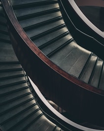 A beautifully crafted wooden staircase in a modern home setting.