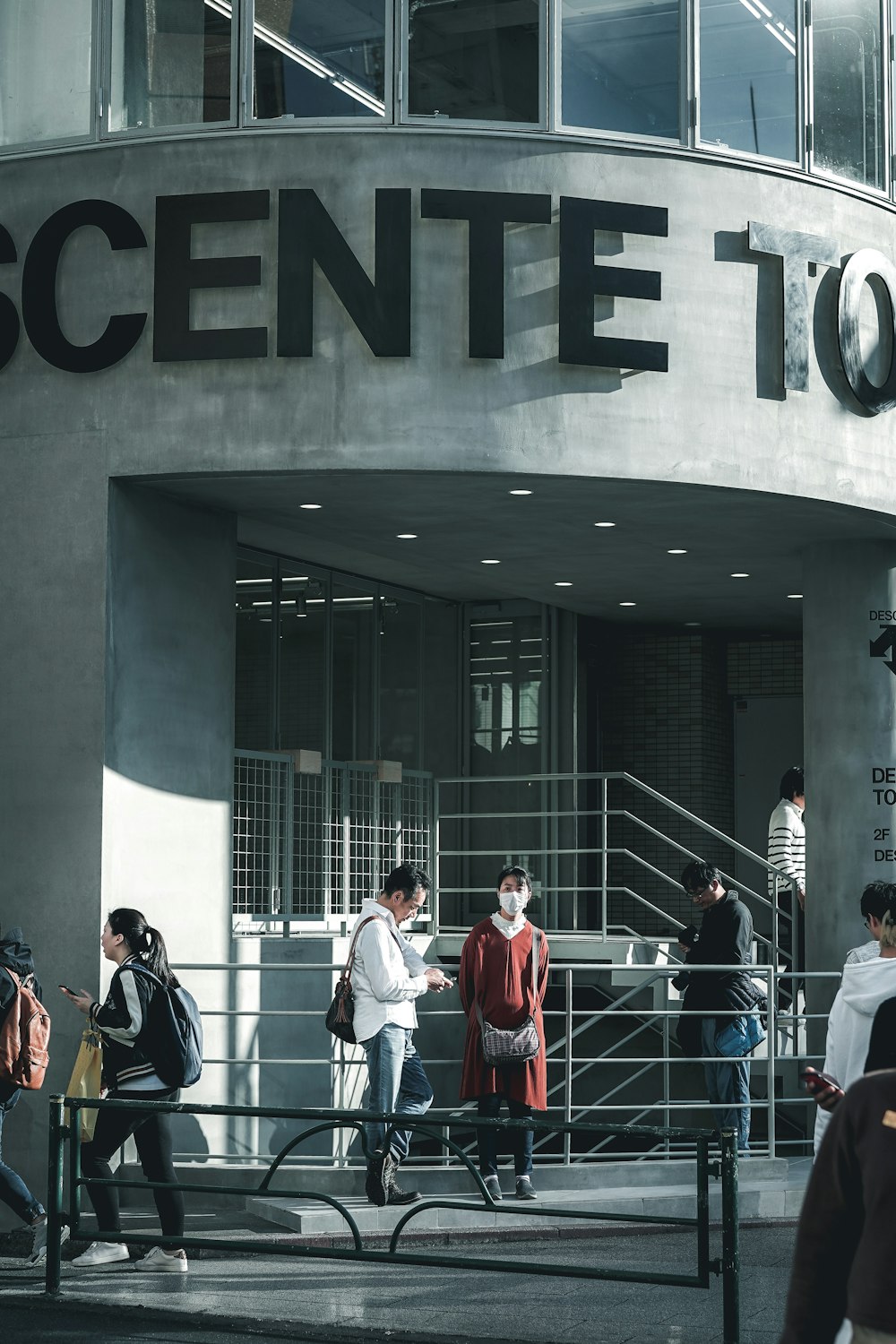 people walking on concrete building