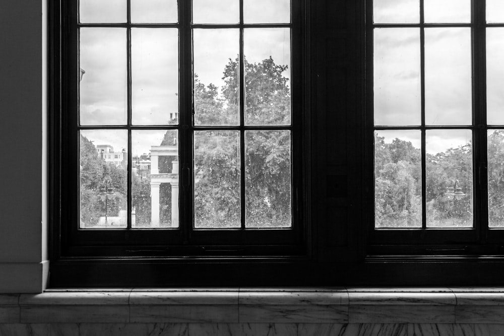 black wooden framed glass window