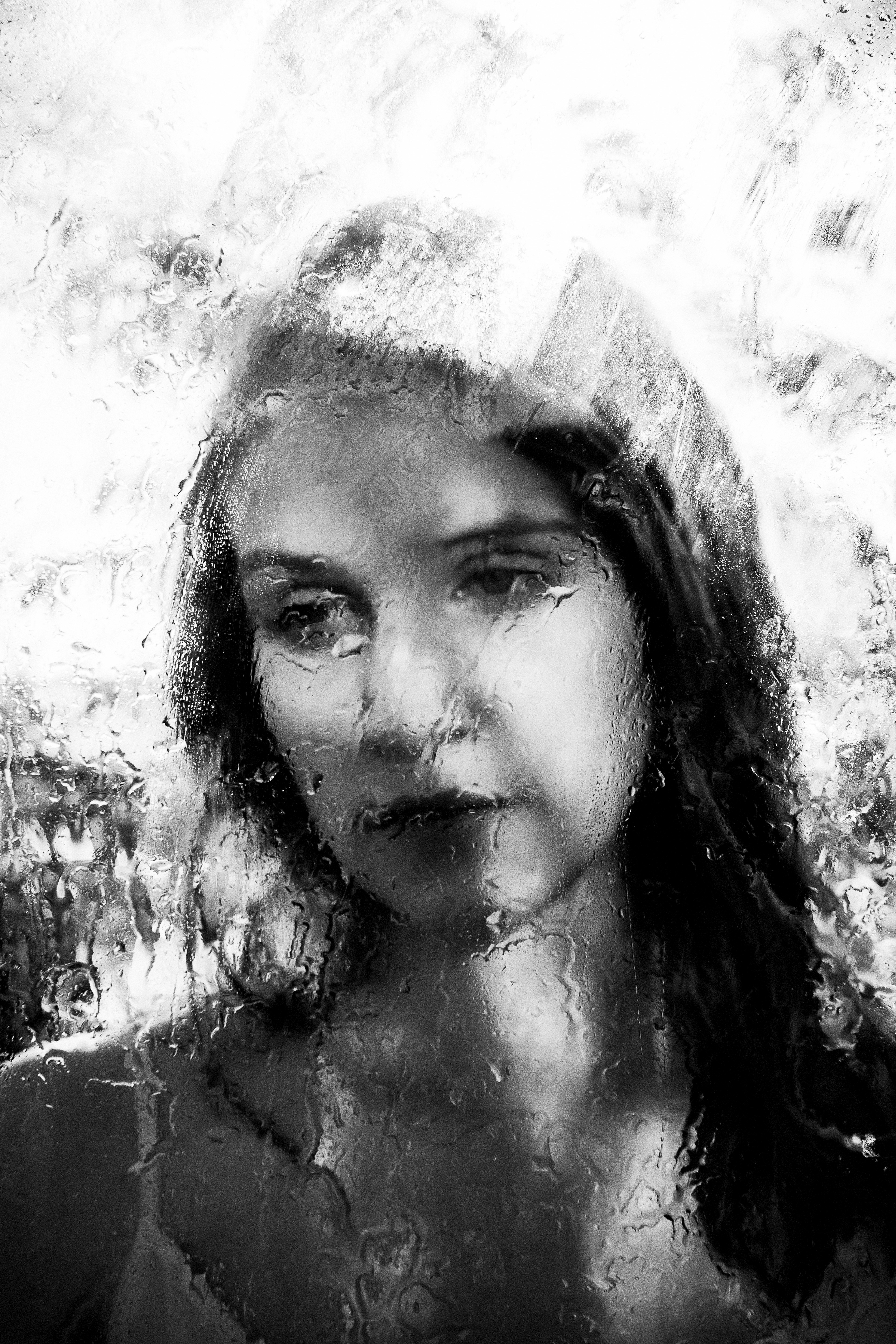 grayscale photo of woman painting