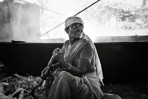 A woman producer at work, in black and white
