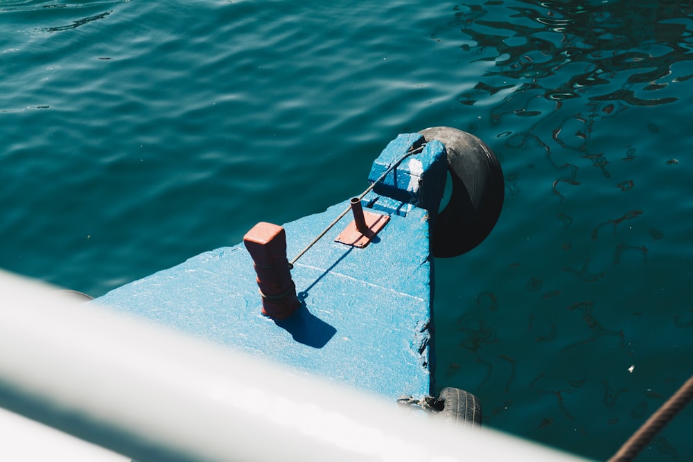 a view of the back end of a boat in the water