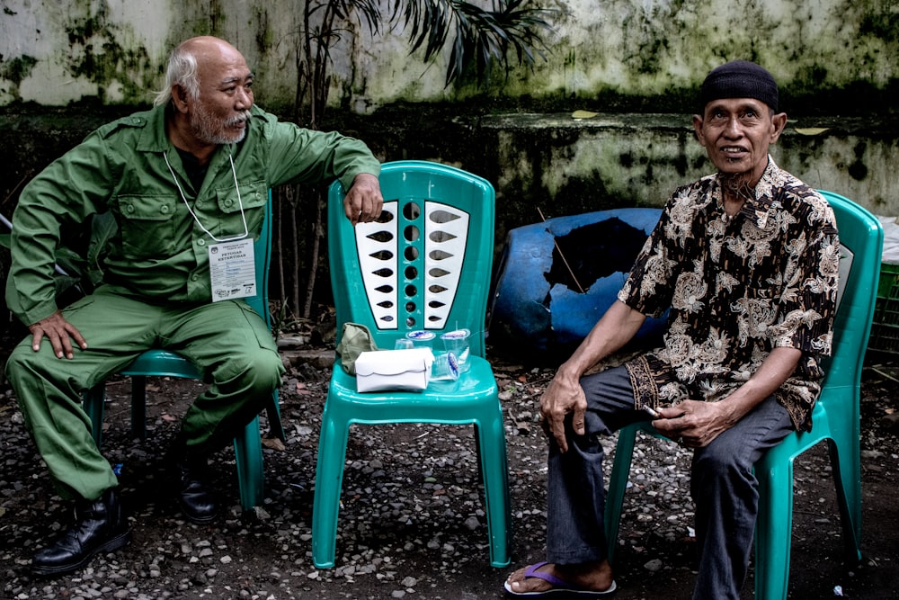 two man sitting on chairs