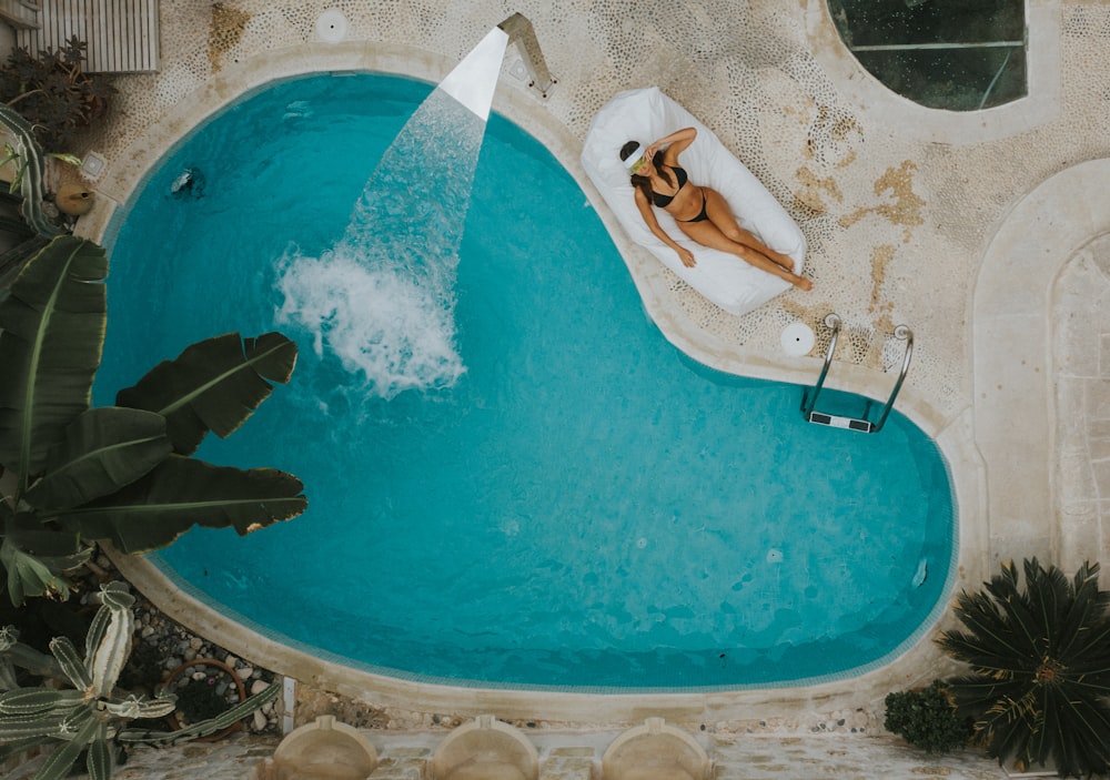 top-angle photography of outdoor swimming pool