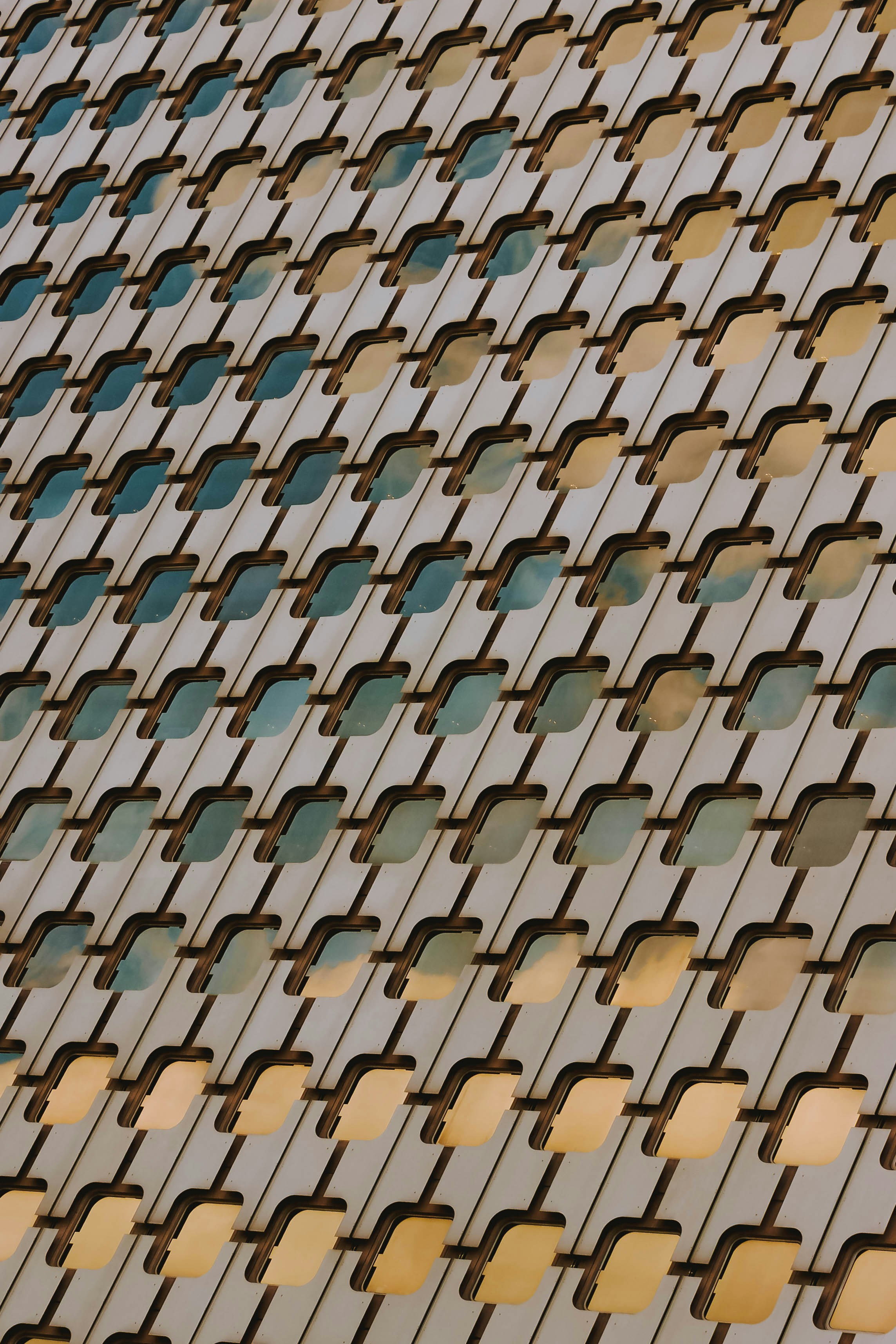 a close up of a building with a clock on it's side