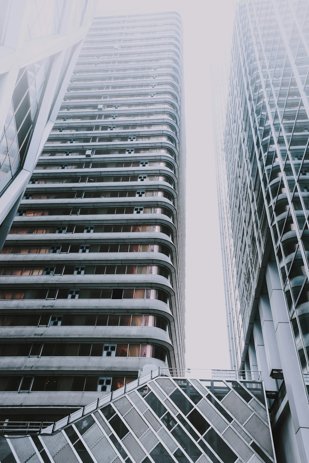 high-top gray concrete buildings during daytime