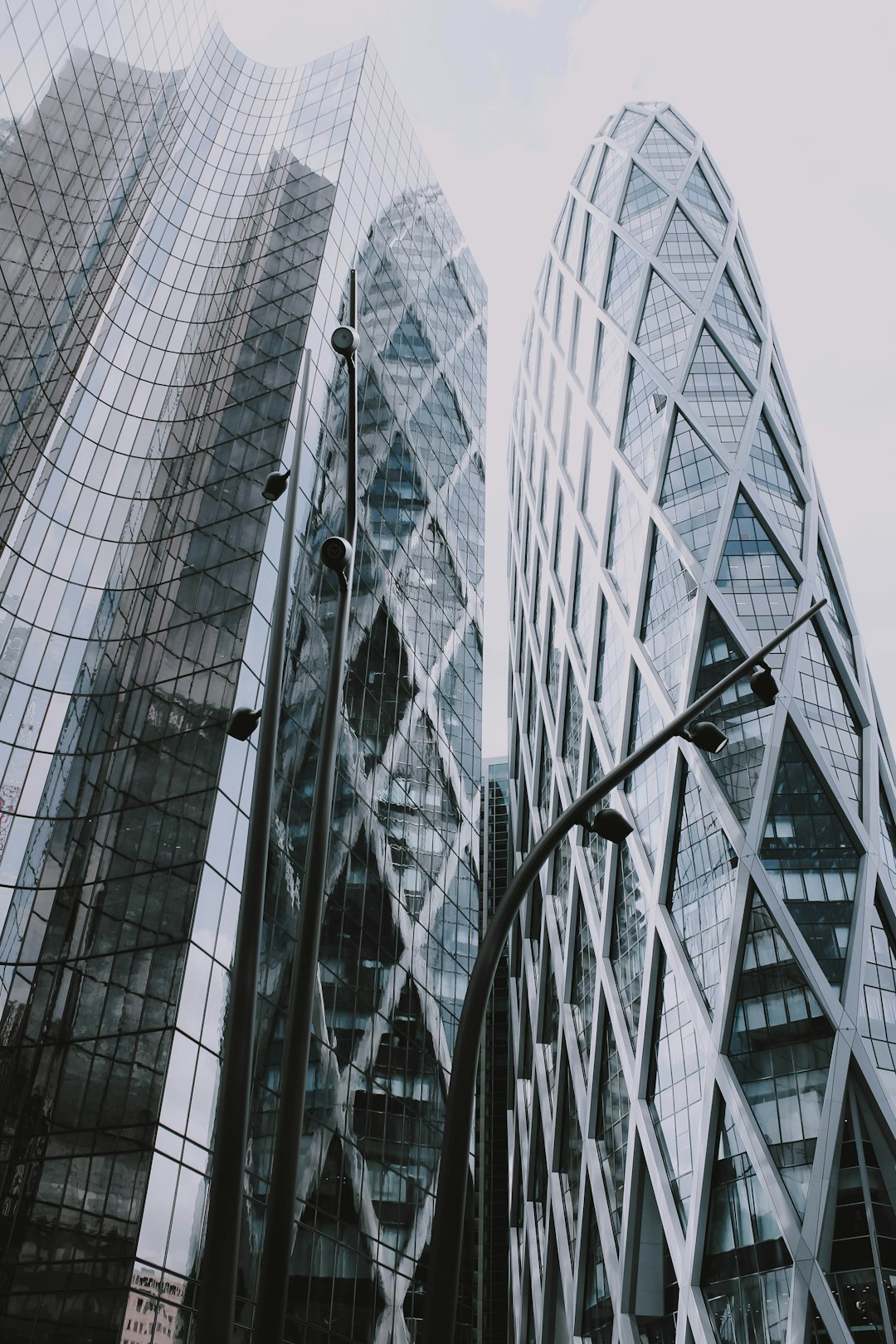 low angle photography of glass curtain buildings during daytime