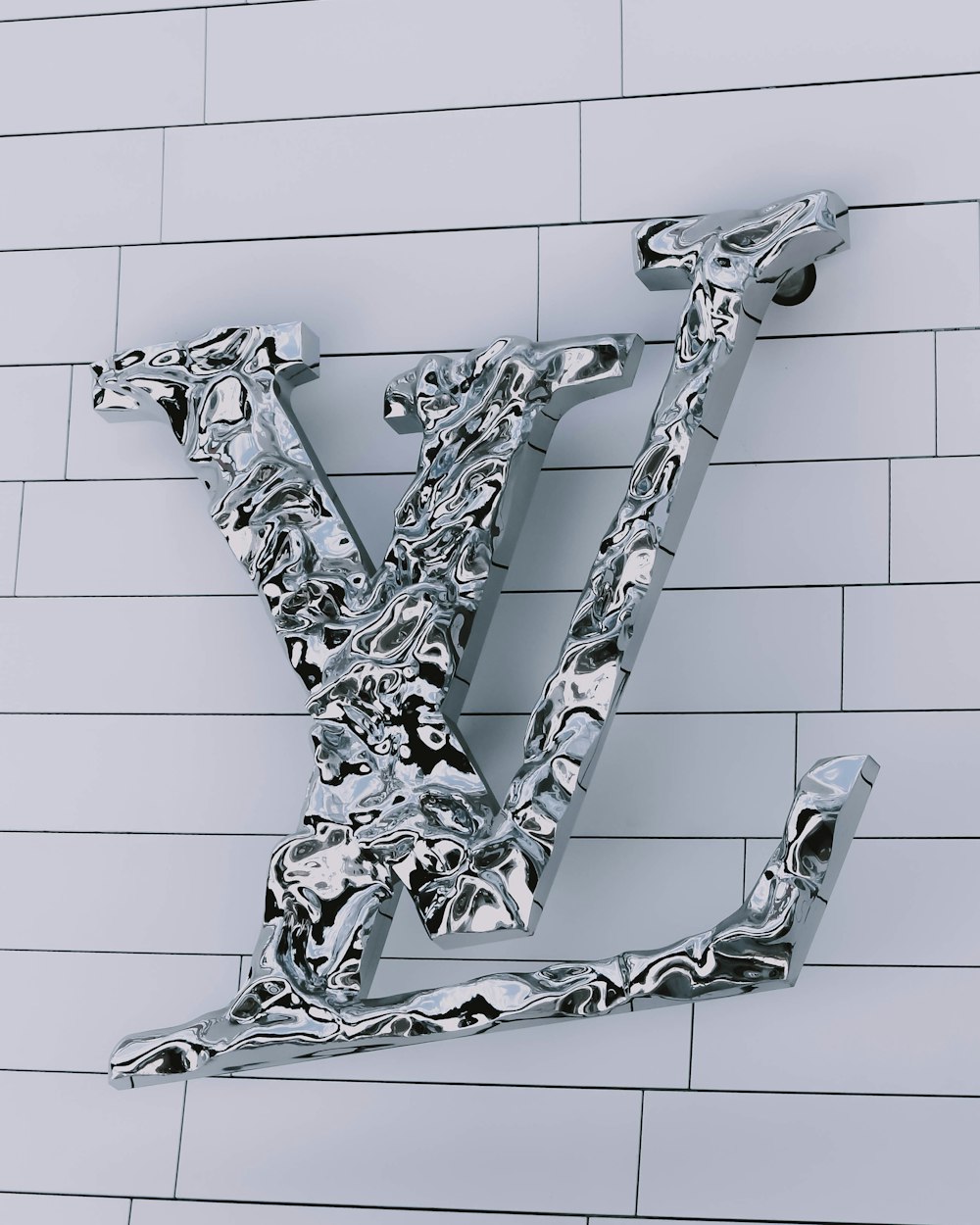 gray and white Louis Vuitton logo