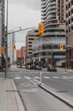 vehicle on road near buildings during daytime