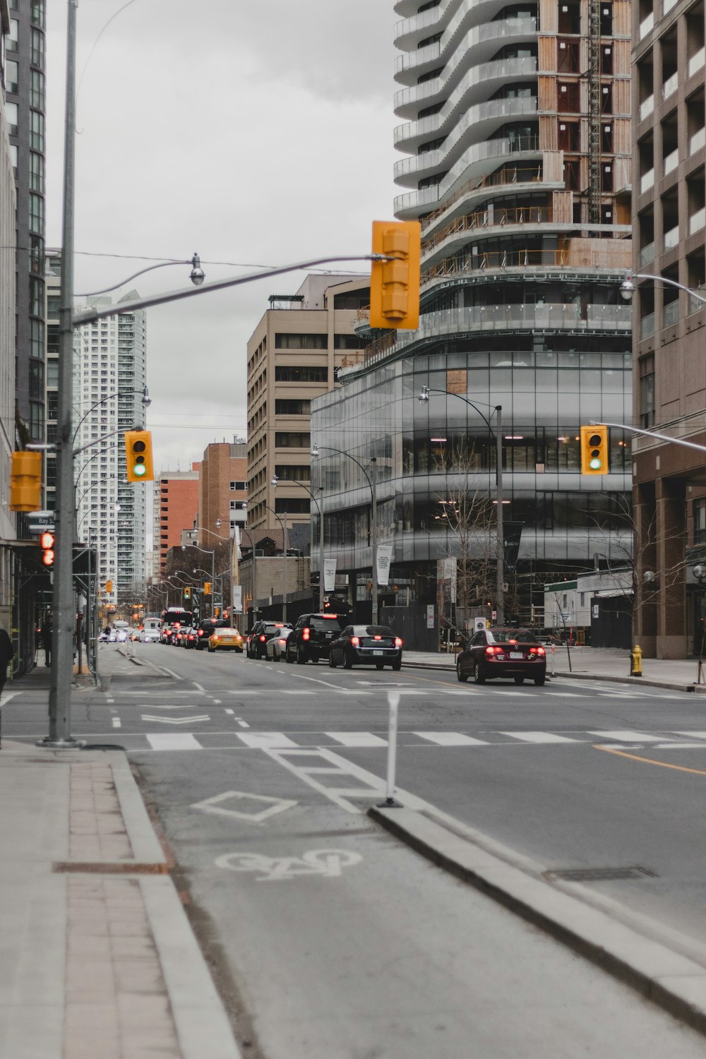 vehicle on road near buildings during daytime