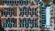 Aerial view of a prefabricated housing project in a suburban area.