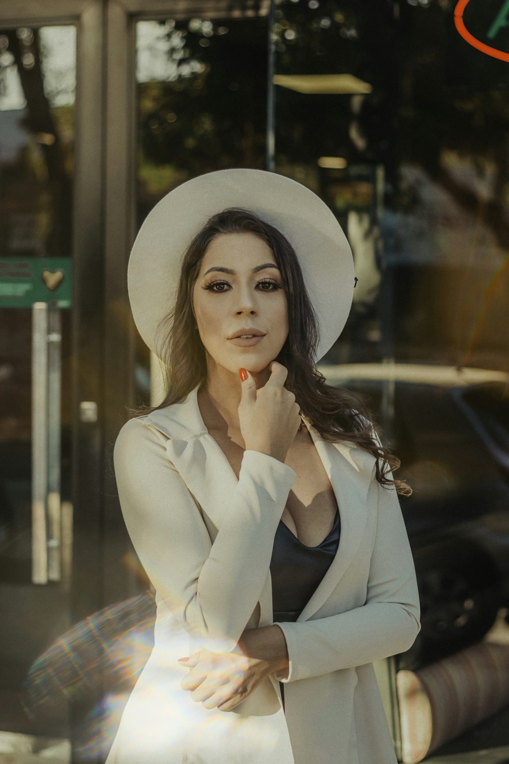 woman wearing white hat