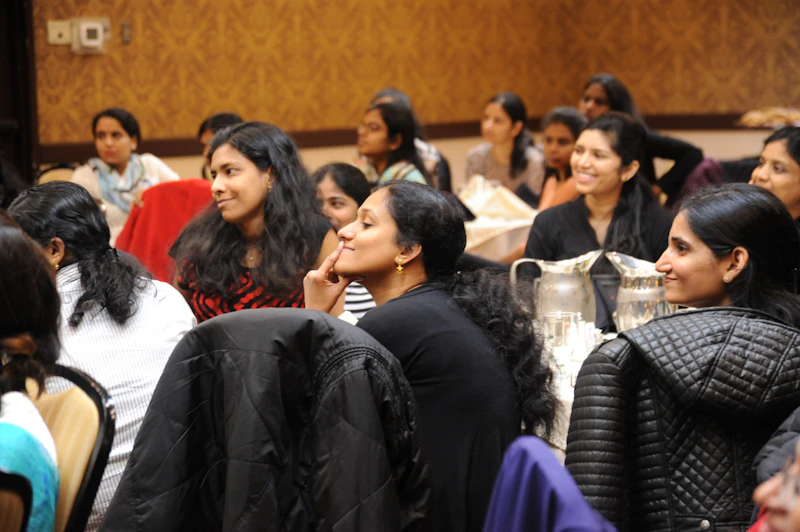 Group of women listening at a live workshop