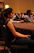 A professional woman attentively participating in an AML compliance training session.