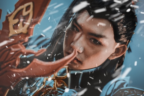 Close-up of a fierce heroine in metallic armor, set against a stormy background.