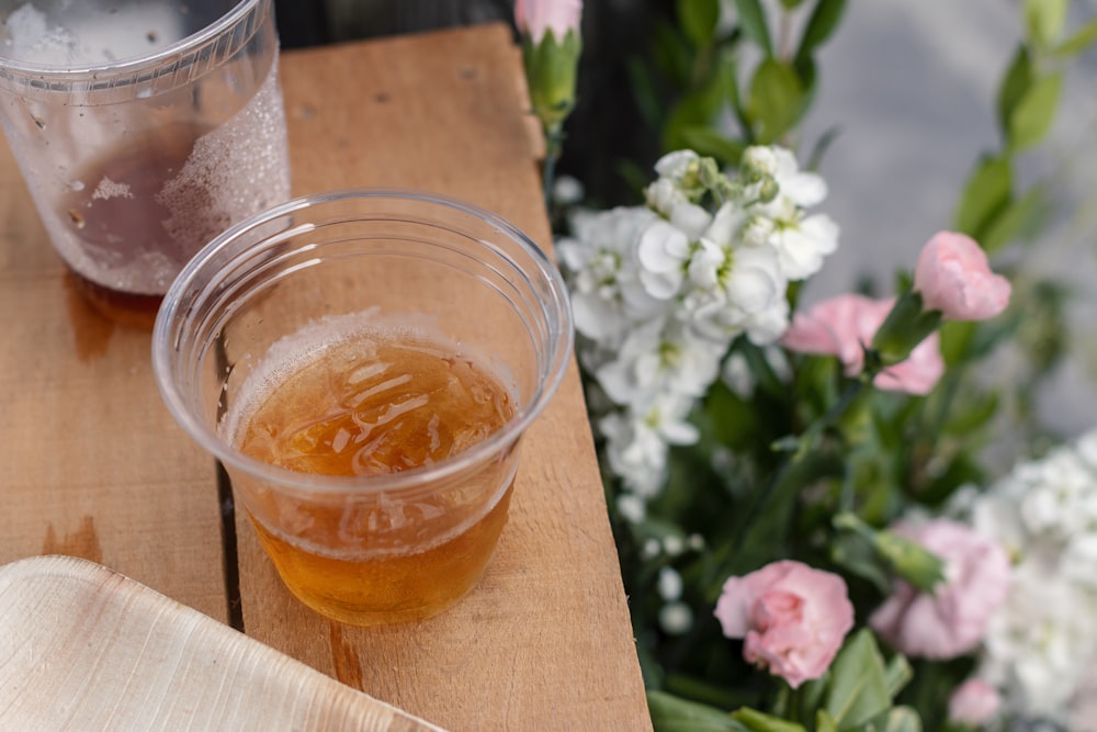 half-filled plastic cup on table