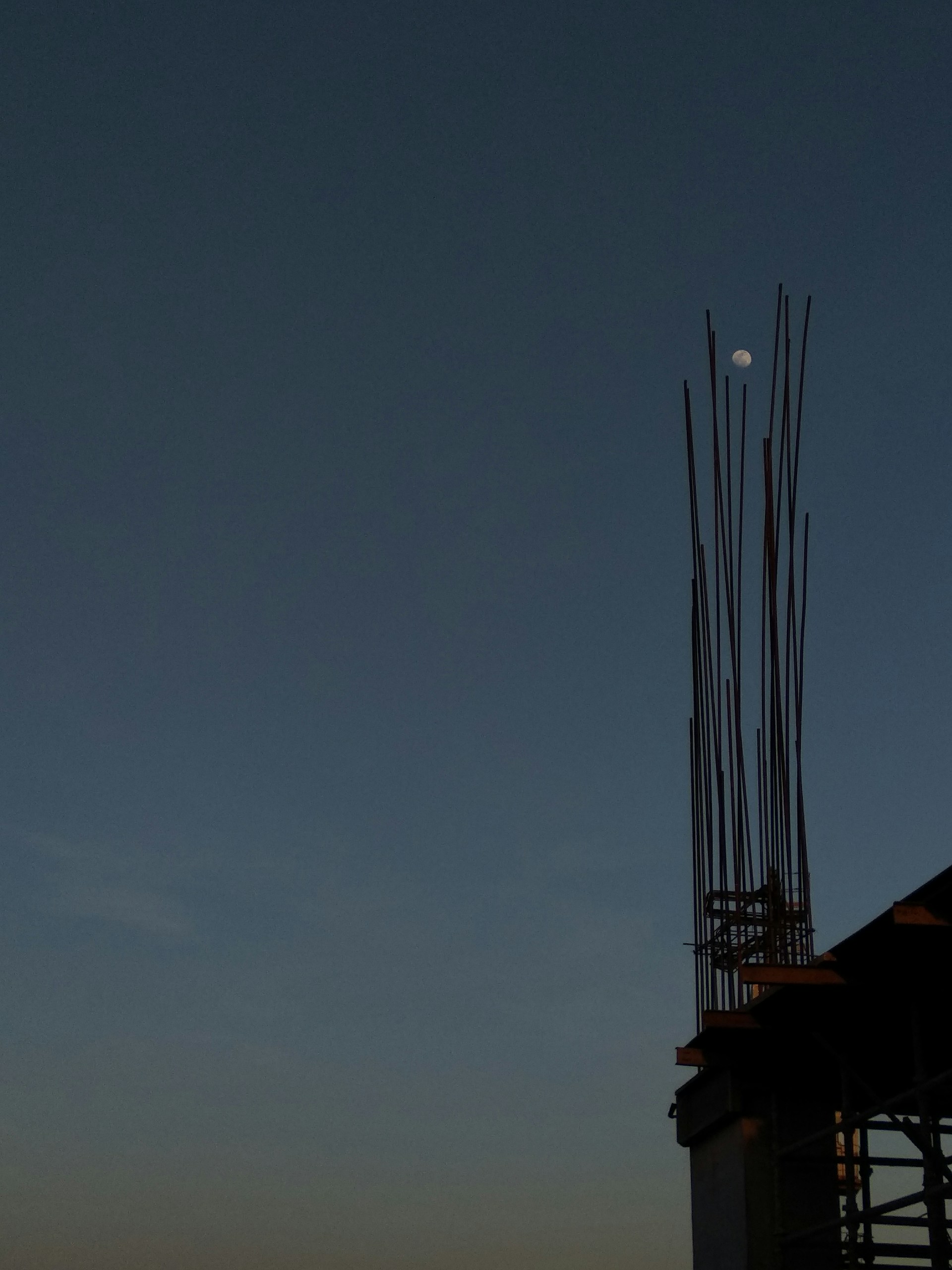 woman wearing yellow long-sleeved dress under white clouds and blue sky during daytime