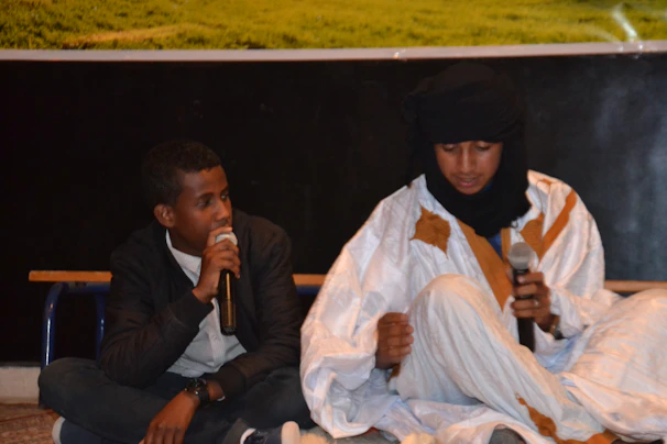 A candid moment capturing Mr. Elaraby in conversation with a notable figure.
