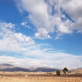 A panoramic view of a newly developed residential lot in Desaguadero, Puno, showing clear skies and natural surroundings.