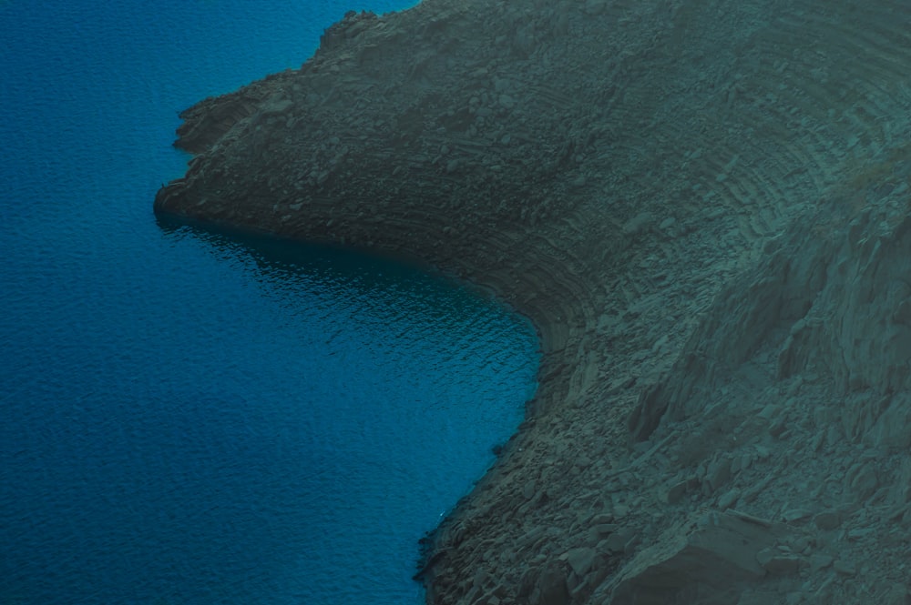 blue calm body of water