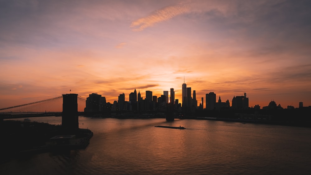 silhouette photography of high-rise buildings