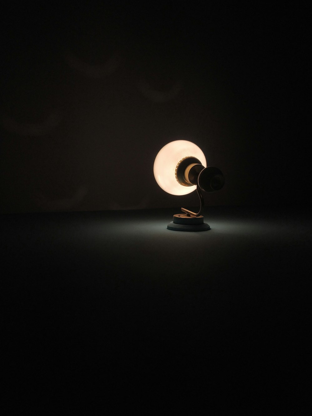 turned-on table lamp