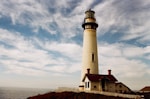 lighthouse near body of water