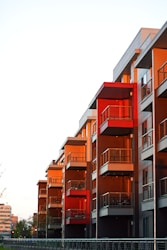 red and white concrete building at daytime