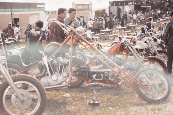 Community event with riders and fans celebrating outdoors.