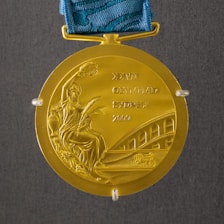 round gold-colored medal