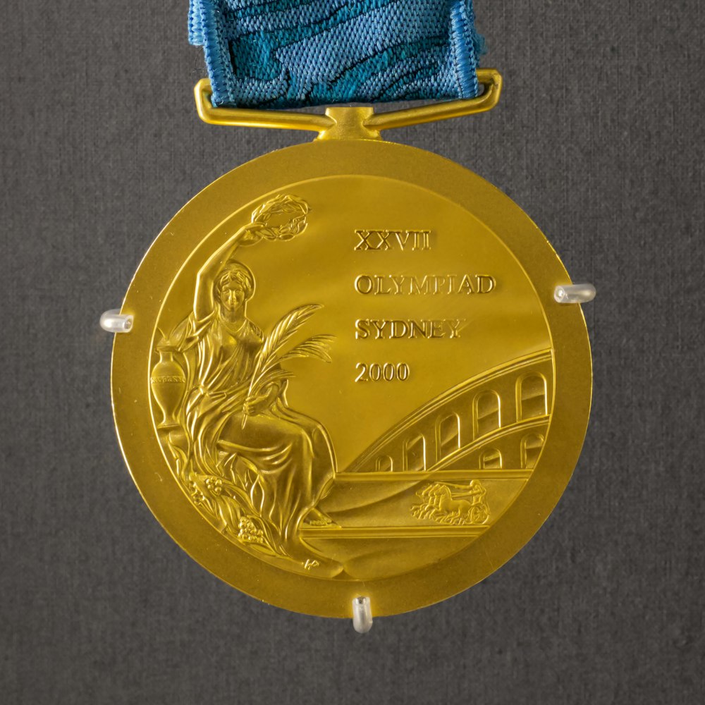 round gold-colored medal