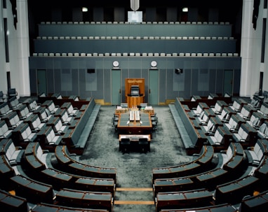 tables and chairs inside the hall