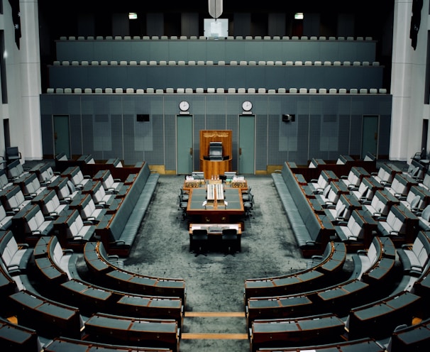 tables and chairs inside the hall