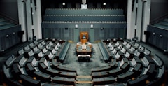 tables and chairs inside the hall