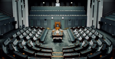 tables and chairs inside the hall