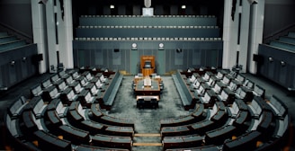 tables and chairs inside the hall